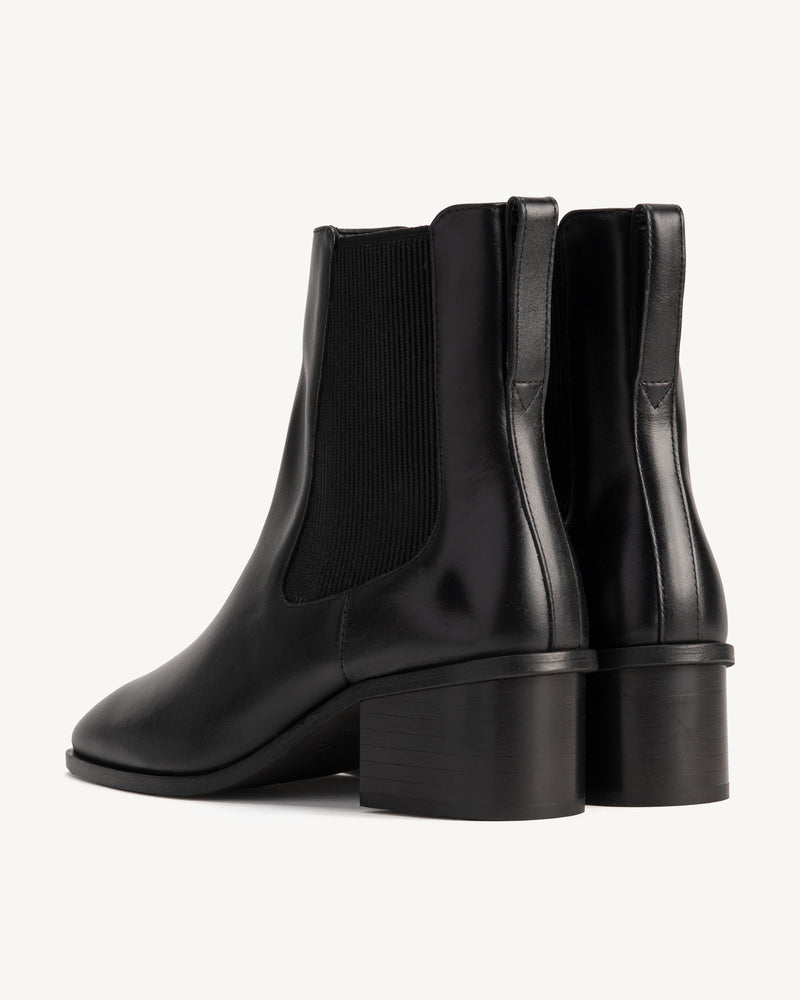 Back view of The Quinn Chelsea Boot Black in smooth leather. Sizes 5–12