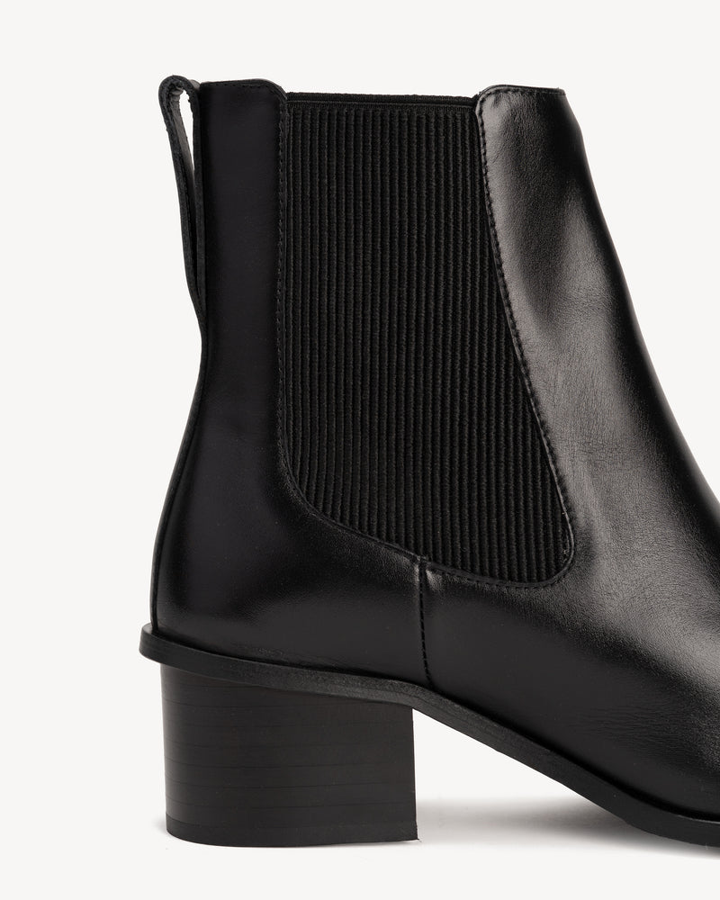 Close-up detail of The Quinn Chelsea Boot Black in smooth leather. Sizes 5–12