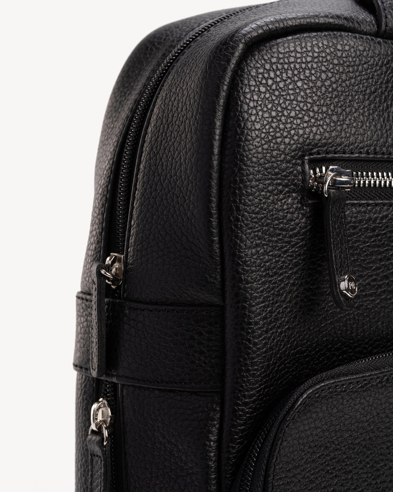 Back view of The Refined Backpack Black in pebbled leather
