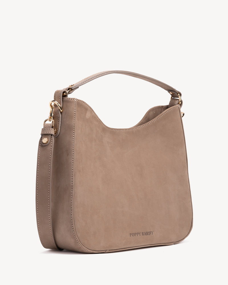 Angled view of The Sixteenth Tote Clay in Neutral nubuck