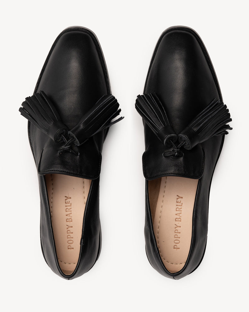 Top view of The Tassel Daily Loafer Black in smooth leather. Sizes 5–12, wide available