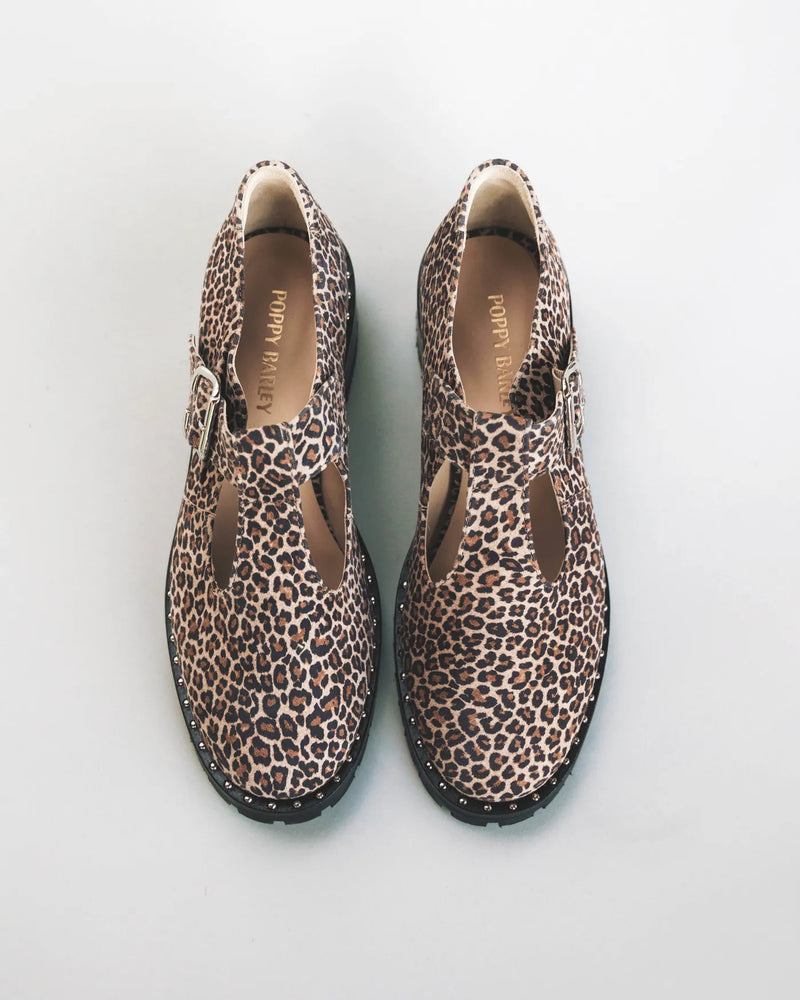 T-bar Mary Jane overhead, Poppy Barley insoles visible. The Academy Mary Jane Micro Leopard. Sizes 5–12.