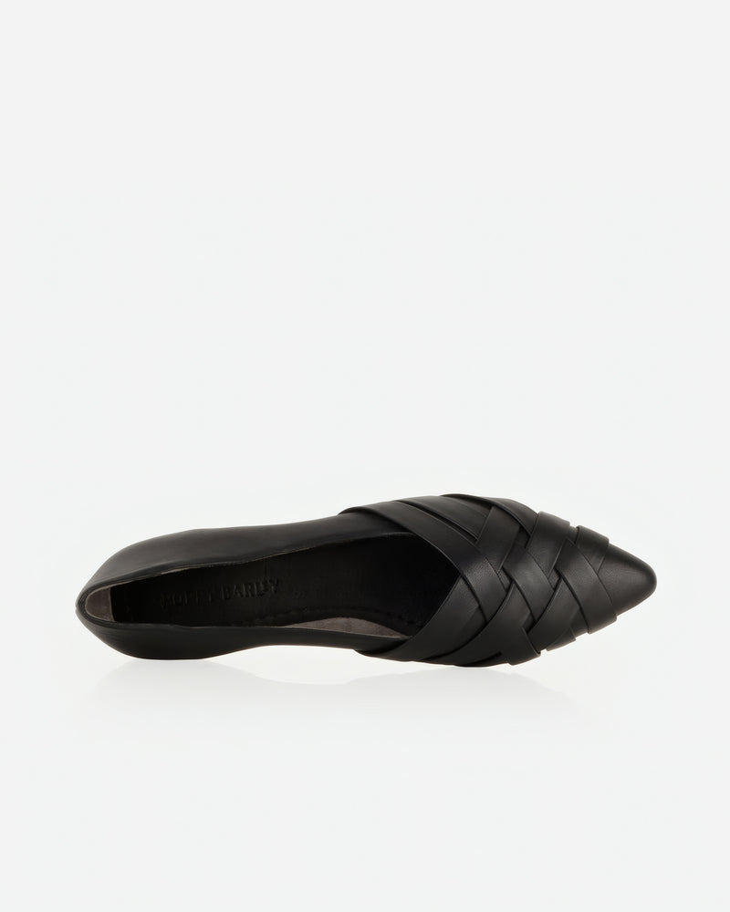 Flat lay of The Athena Flat Black in smooth leather. Sizes 5–12