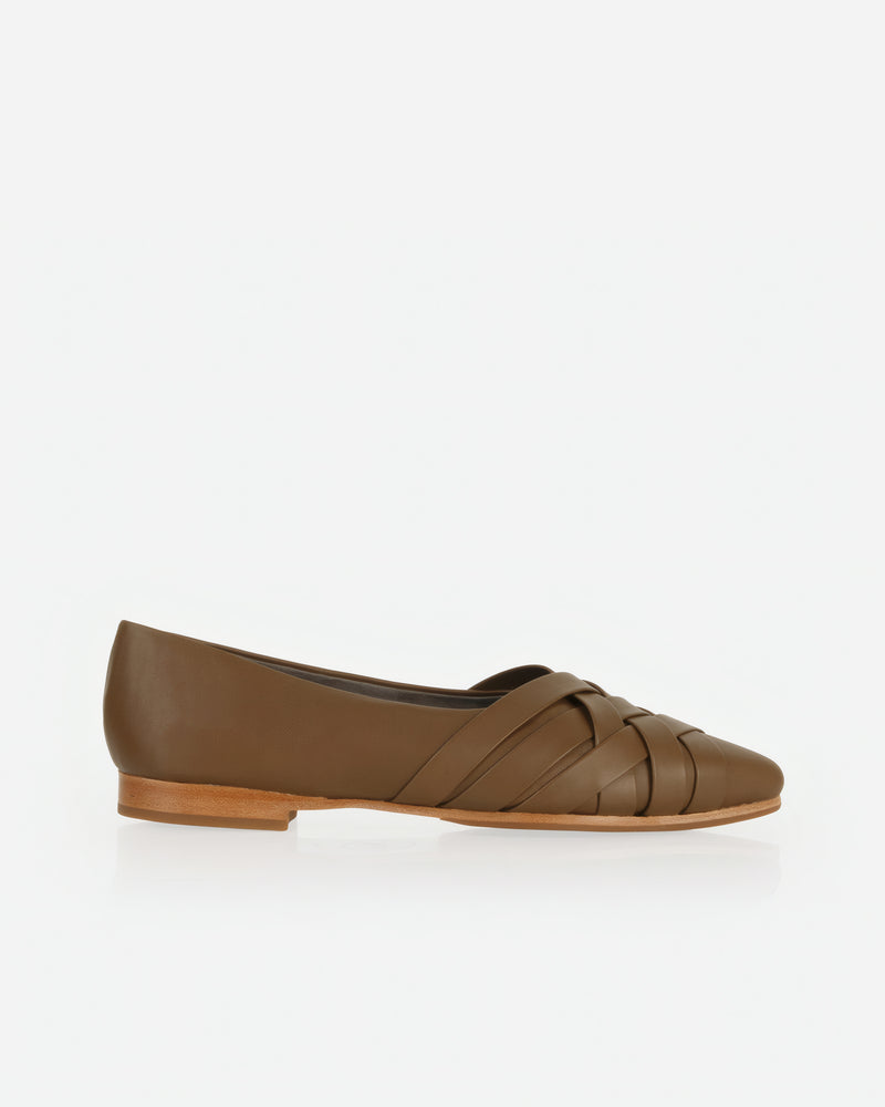 Flat lay of The Athena Flat Tapenade in Green, Brown smooth leather. Sizes 5–12, wide available