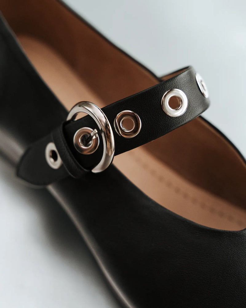 Close-up of leather Mary Jane with silver buckle eyelet strap. The BLVD Mary Jane Black. Sizes 5–12, available in wide.