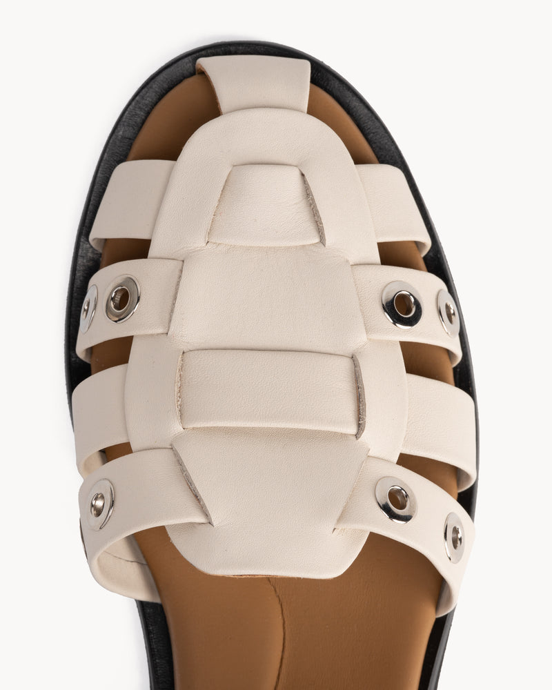 Close-up detail of The Beachcomber Sandal Oat Milk and Silver in White, Neutral smooth leather. Sizes 5–12