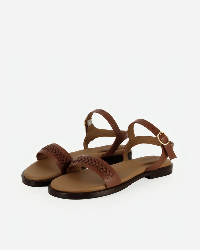 Pair of The Bohème Sandal Hazelnut in Brown smooth leather. Sizes 5–12