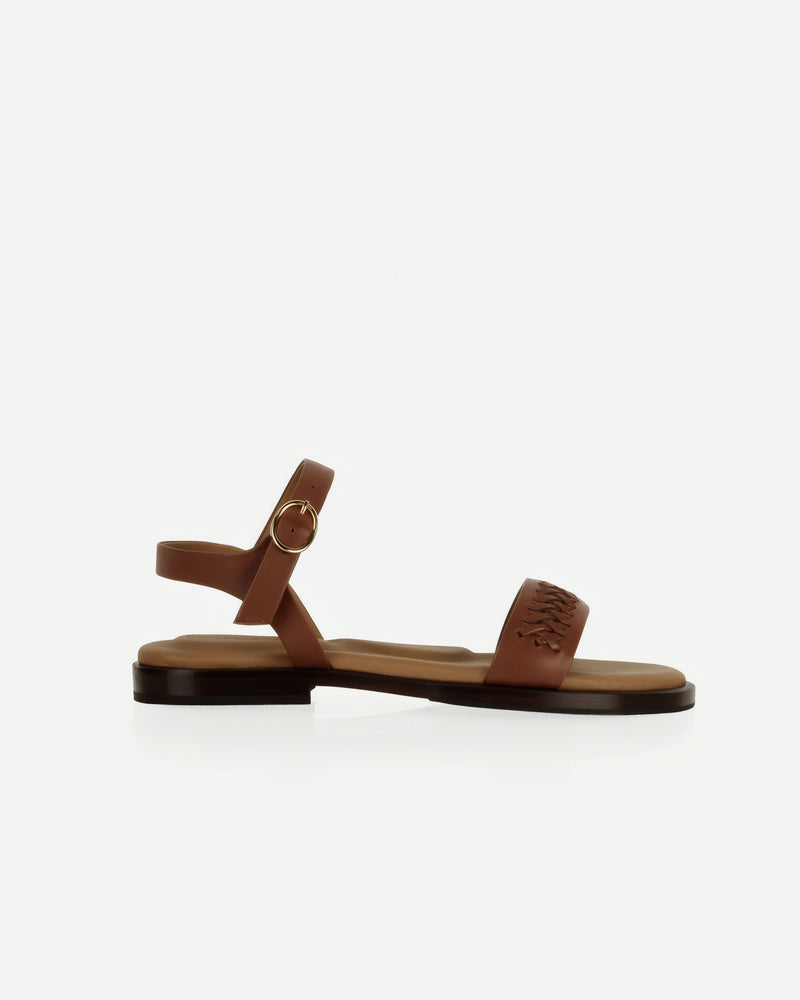 Side view of The Bohème Sandal Hazelnut in Brown smooth leather. Sizes 5–12