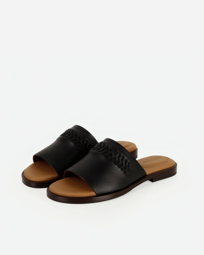 Pair of The Bohème Slide Black in smooth leather. Sizes 5–12