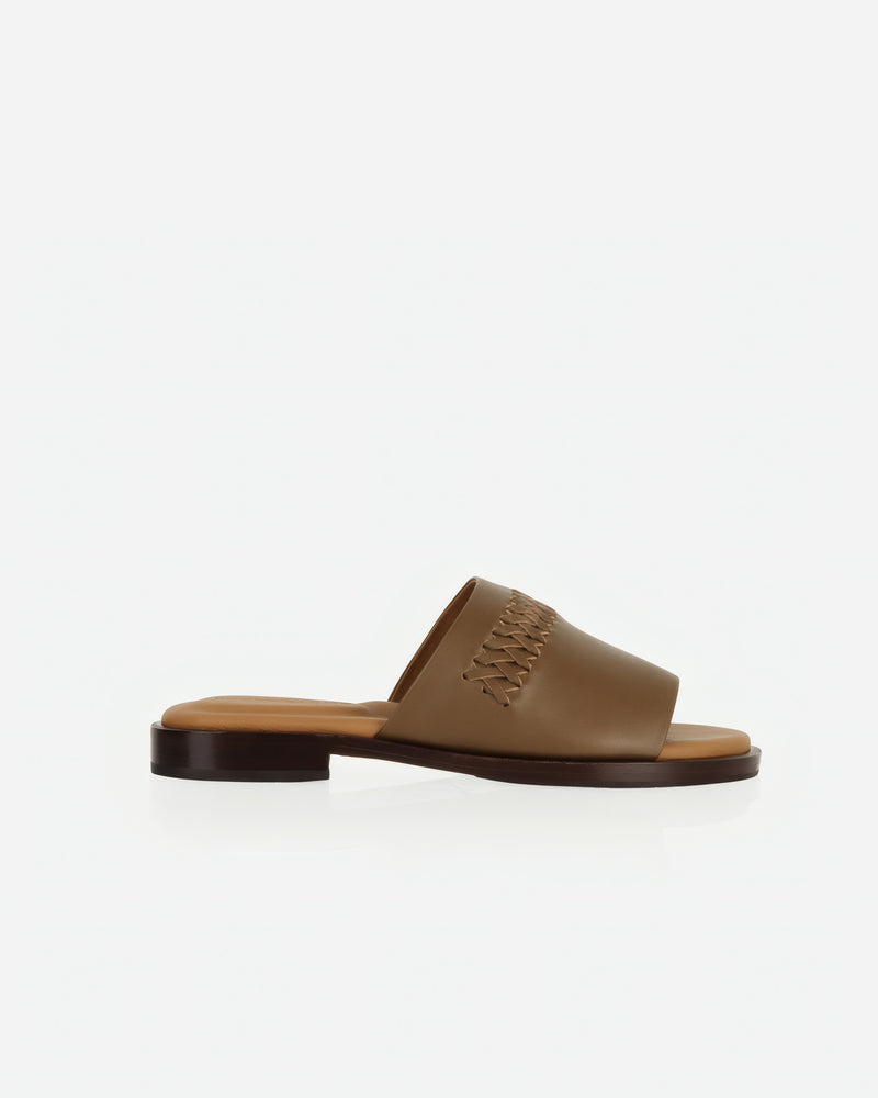 Side view of The Bohème Slide Tapenade in Green, Brown smooth leather. Sizes 5–12, wide available