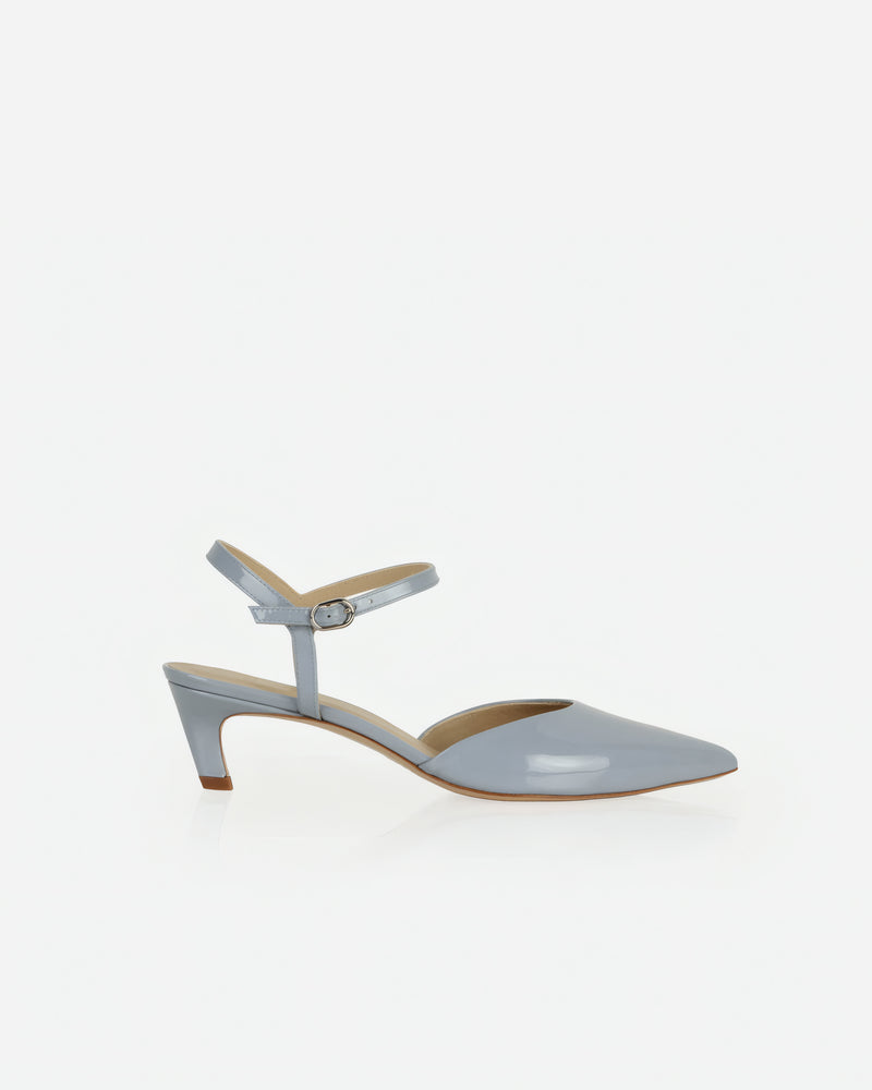 Heel detail of The Claire Kitten Heel Horizon Blue Patent in Blue Horizon leather. Sizes 5–12