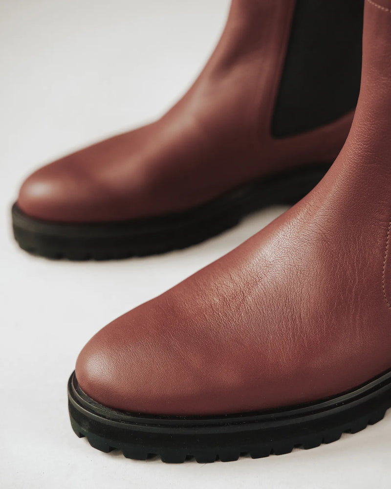 Close-up of the toe and lug sole on leather Chelsea boots. The Every Way Chelsea Boot Redwood. Sizes 5–12.