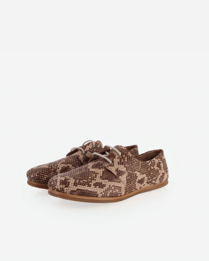 Pair of The Eyelet Oxford 2.0 Desert Snake in Animal Print leather. Sizes 5–12, wide available