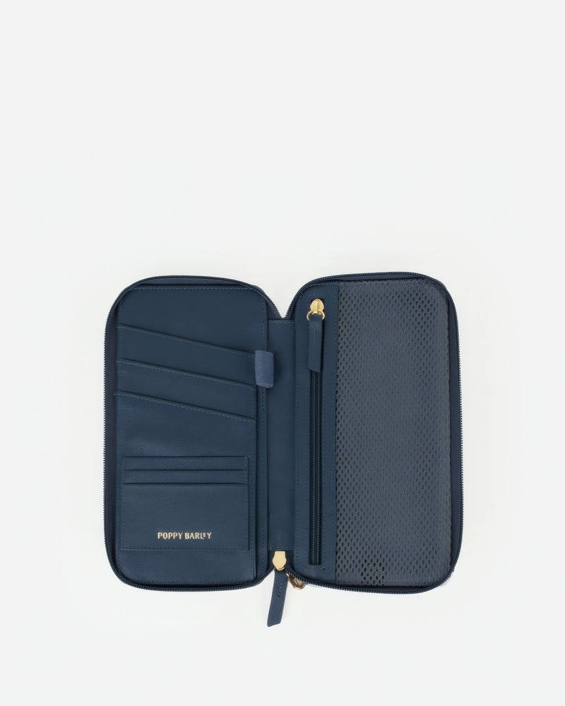 Front view of The Flying Solo Passport Holder Pacific Micro Pebble in Blue pebbled leather