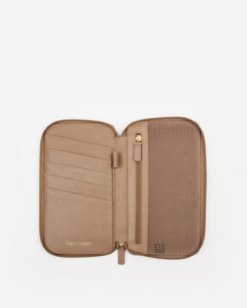 Front view of The Four Person Family Passport Holder Biscotti Micro Pebble in Neutral pebbled leather