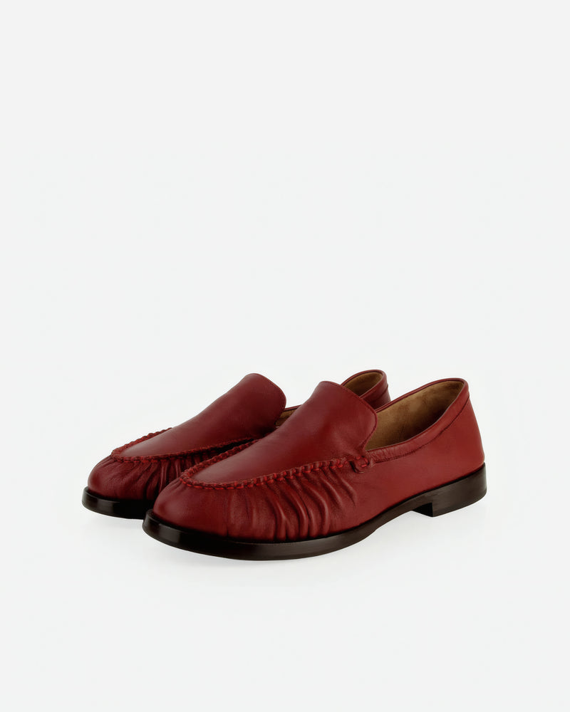 Pair of The Laid Back Loafer Resort Red in Red smooth leather. Sizes 5–12