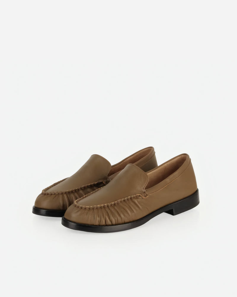 Pair of The Laid Back Loafer Tapenade in Green, Brown smooth leather. Sizes 5–12