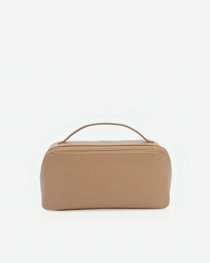Front view of The Cosmetic Case Large Biscotti in Neutral, Brown leather
