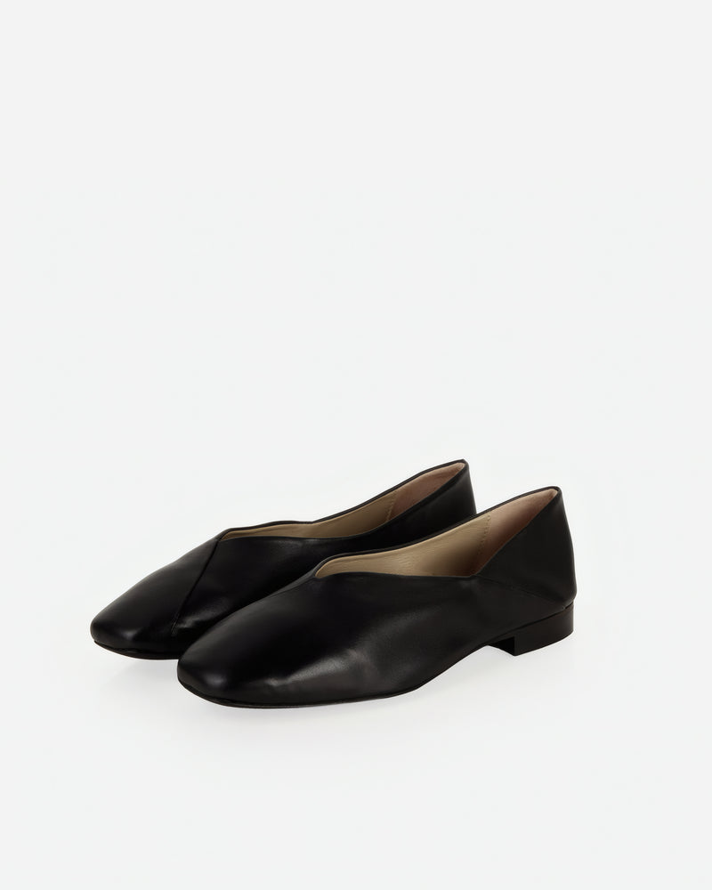 Pair of The Marché Flat Black in smooth leather. Sizes 5–12, wide available