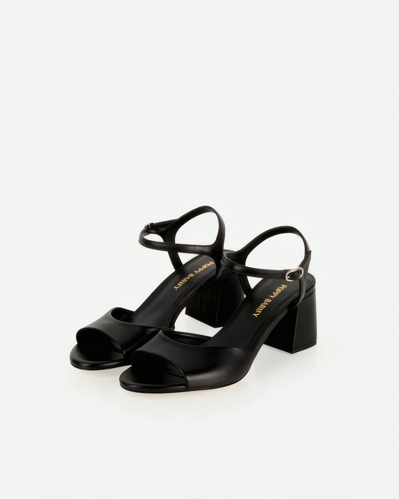 Pair of The Mila Heeled Sandal Black in smooth leather. Sizes 5–12