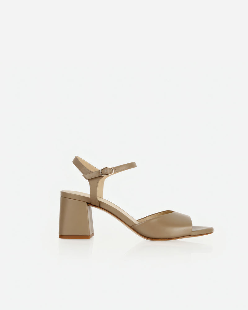Heel detail of The Mila Heeled Sandal Halva in Neutral smooth leather. Sizes 5–12