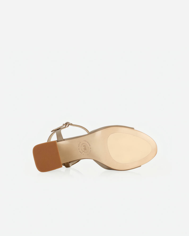 Heel detail of The Mila Heeled Sandal Halva in Neutral smooth leather. Sizes 5–12