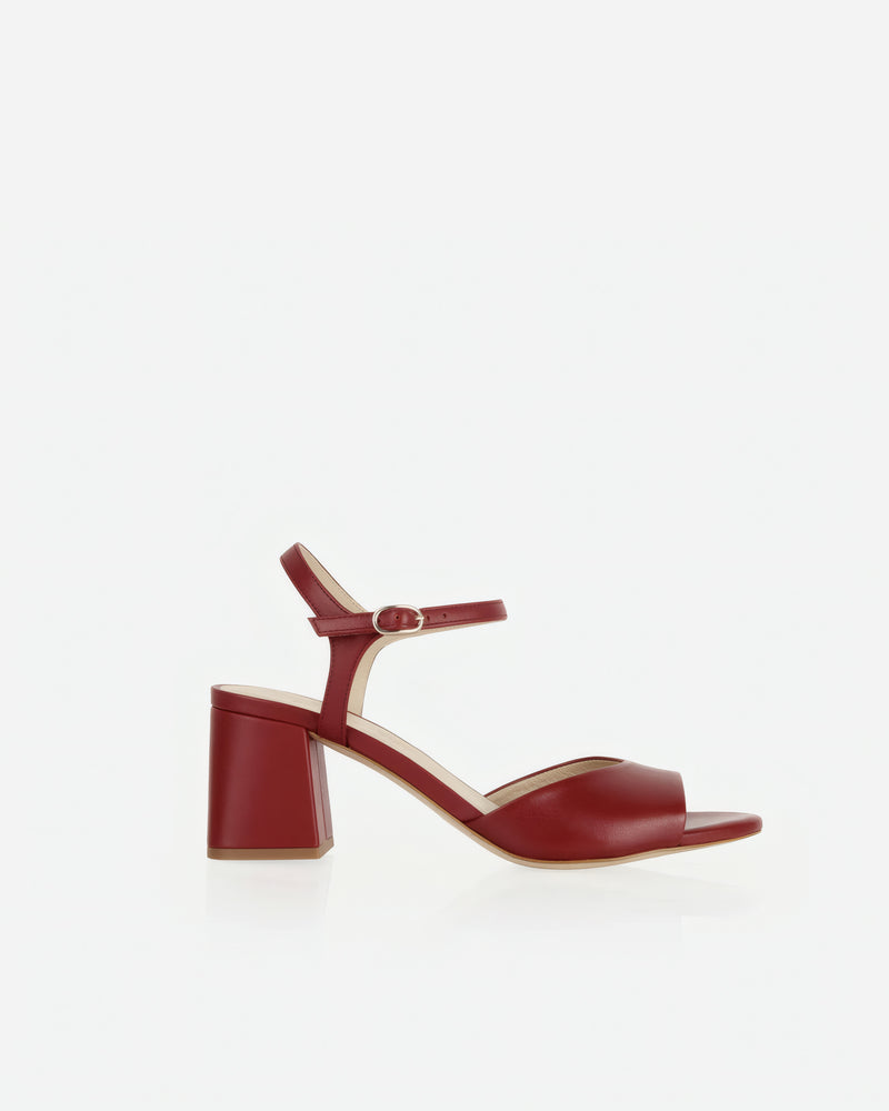 Heel detail of The Mila Heeled Sandal Rioja in Red smooth leather. Sizes 5–12
