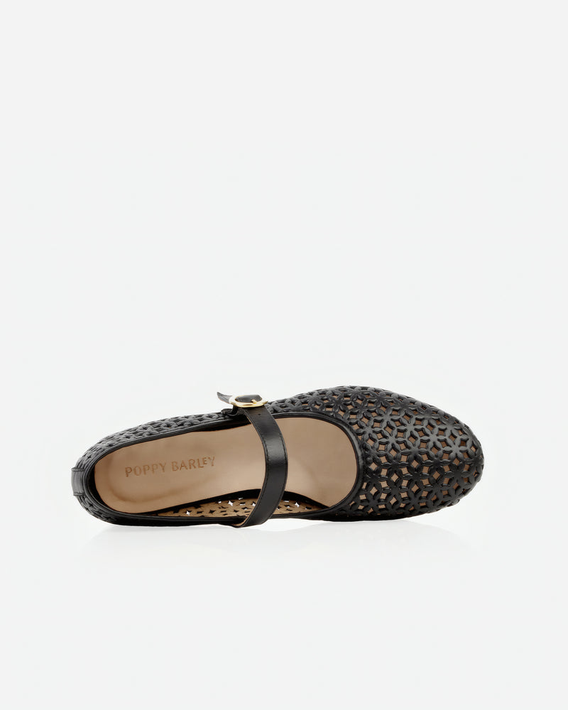Top view of The Modern-Day Mary Jane Perforated Black in Black leather. Sizes 5–12, wide available