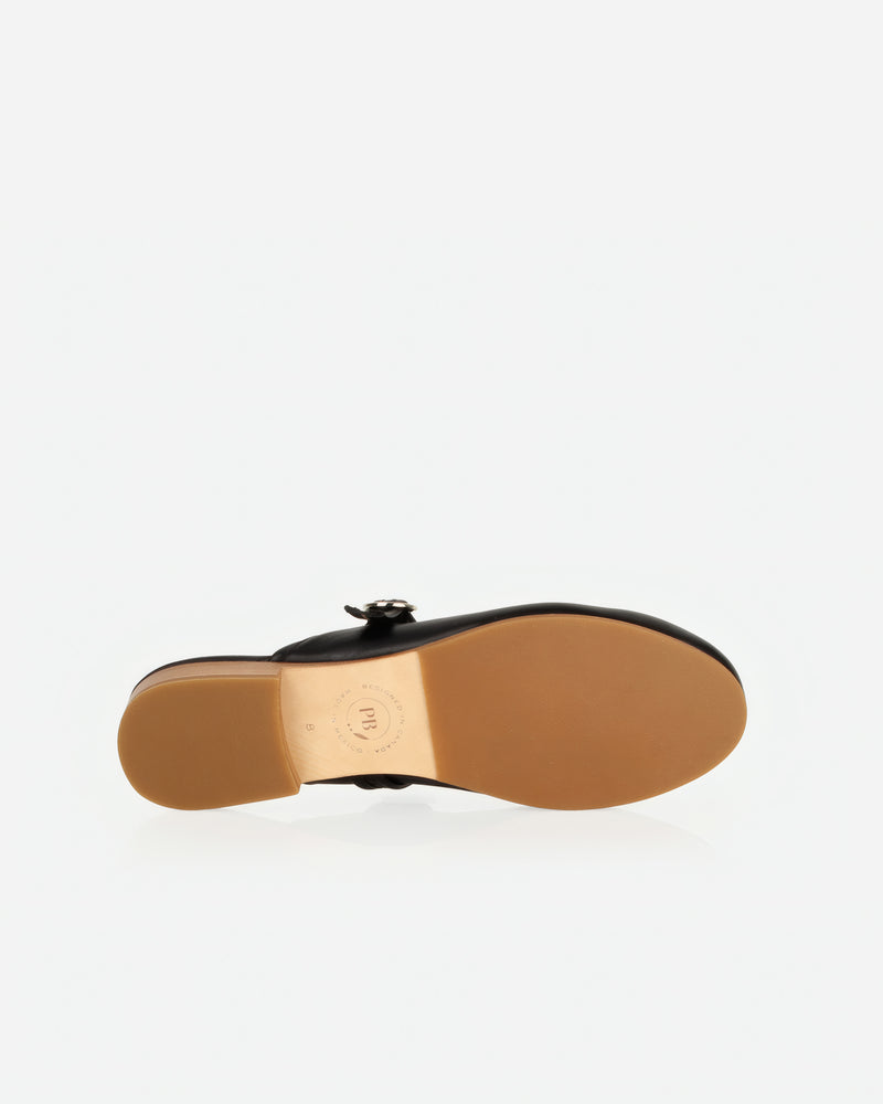 Sole view of The Modern-Day Mule Black in smooth leather. Sizes 5–12, wide available