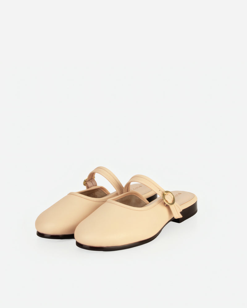 Pair of The Modern-Day Mule Oat Milk in White smooth leather. Sizes 5–12, wide available