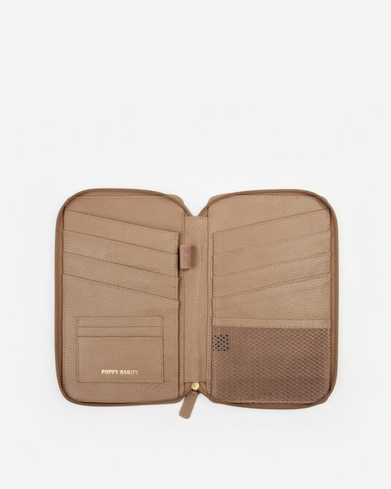 Front view of The Six Person Family Passport Holder Biscotti Micro Pebble in Neutral pebbled leather