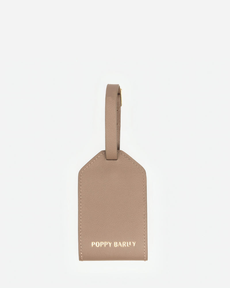 Back view of The Slim Luggage Tag Biscotti in Neutral, Brown leather