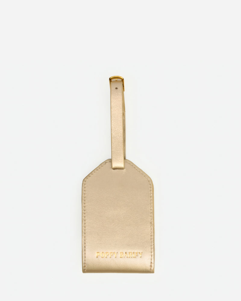 Back view of The Slim Luggage Tag Champagne in Metallic leather