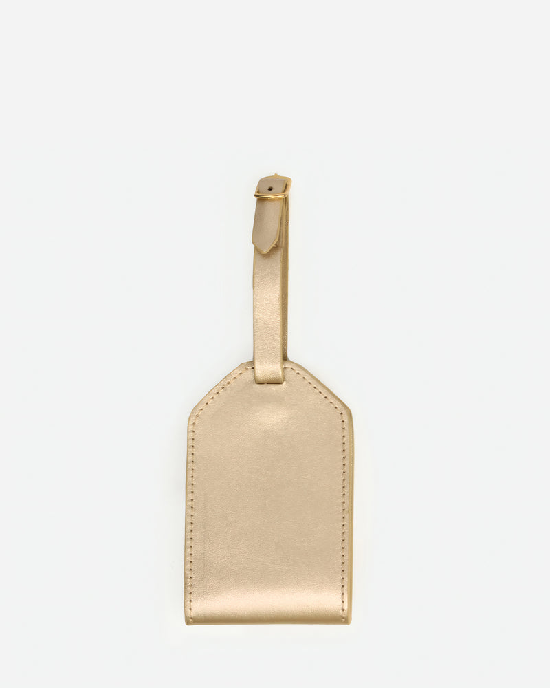 Front view of The Slim Luggage Tag Champagne in Metallic leather