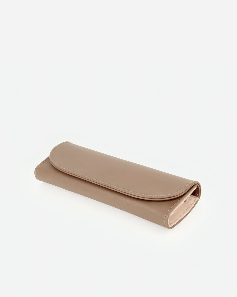 Angled view of The Travel Jewelry Case Biscotti in Neutral, Brown leather