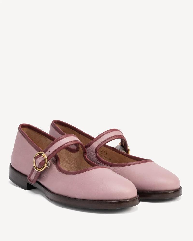 Angled pair of round-toe flats with single buckle strap. The Today Mary Jane Dusty Mauve. Sizes 5–12.
