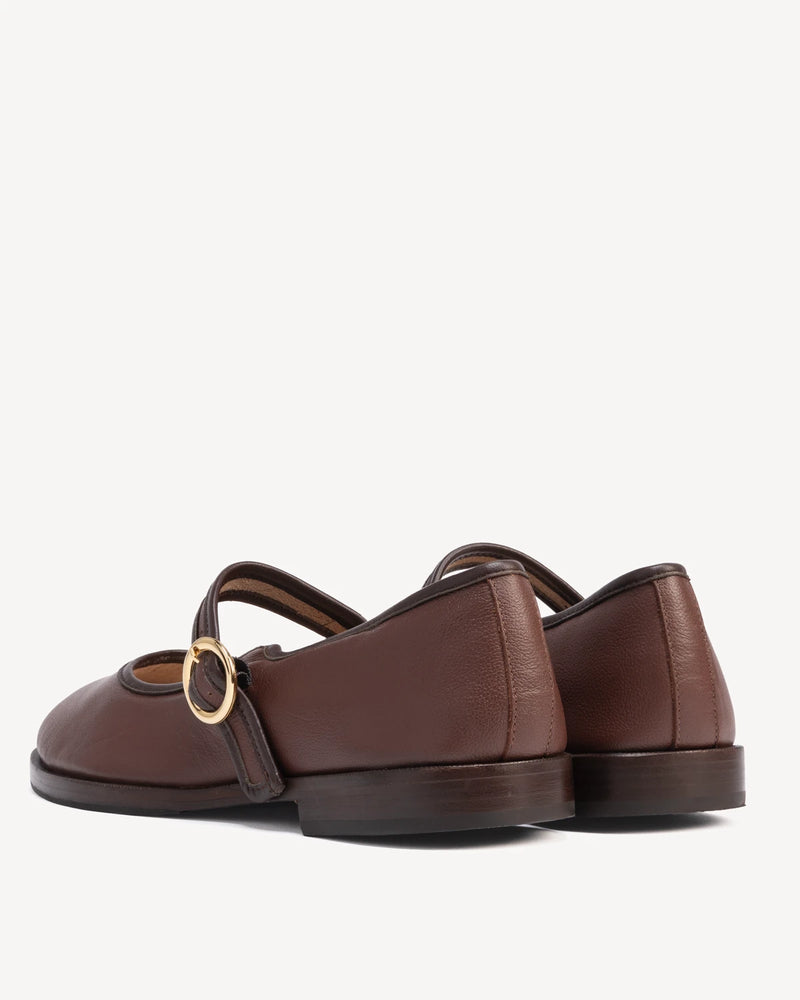 Back view showing single strap and buckle on round-toe flats. The Today Mary Jane French Press. Sizes 5–12.