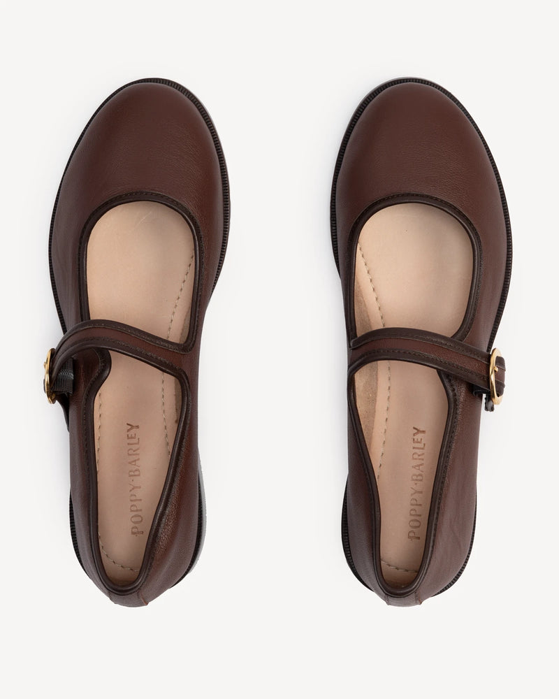 Overhead view of round-toe flats with single strap. The Today Mary Jane French Press. Sizes 5–12.