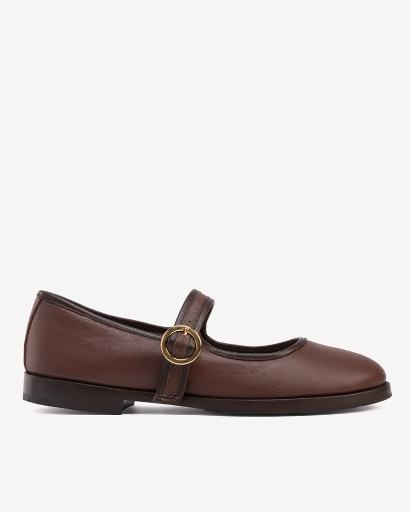 Side view of round-toe flat with single buckle strap. The Today Mary Jane French Press. Sizes 5–12.
