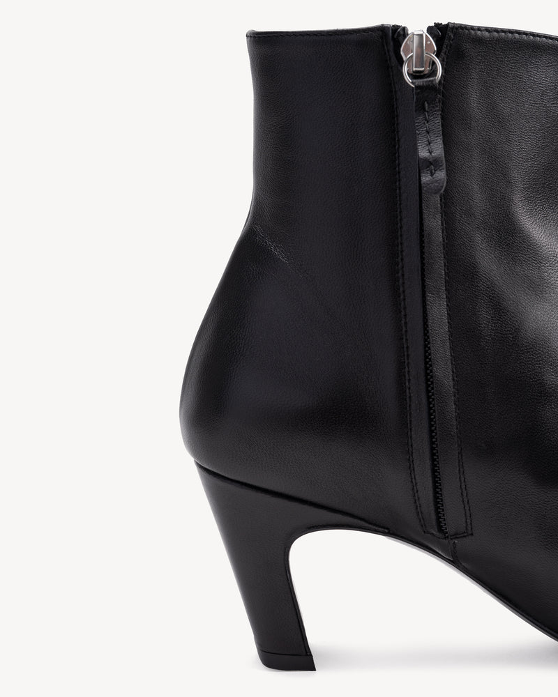 Close-up detail of The Toujours Boot Black in smooth leather. Sizes 5–12, wide available