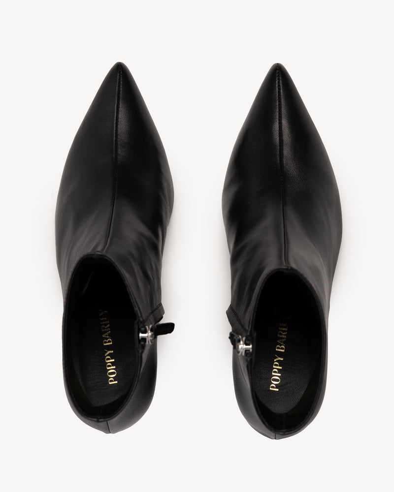 Top view of The Toujours Boot Black in smooth leather. Sizes 5–12, wide available