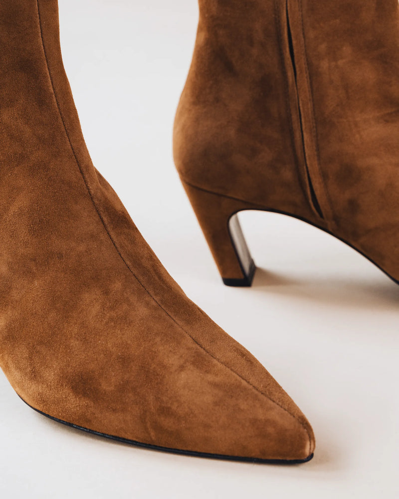 Close-up of The Toujours Boot Cinnamon in suede showing pointed toe and kitten heel detail. Sizes 5–12, wide available.