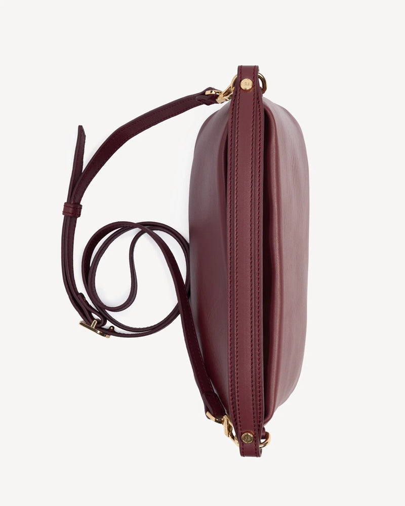 Overhead view of rectangular bag showing zip-top opening. The Via Monte Bag Compote.