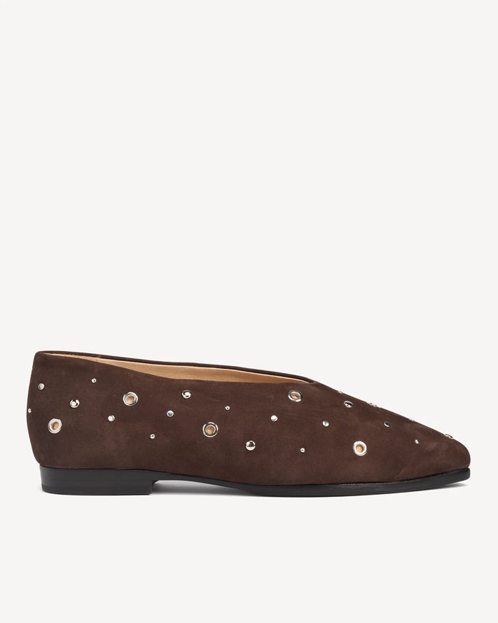 Side view of a suede pointed-toe flat with studs. The Atelier Flat Cocoa Plum Studded. Sizes 5–12, wide available.