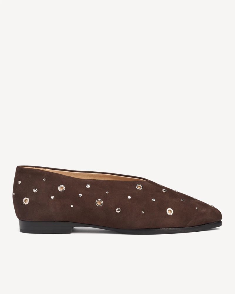 Side view of a suede pointed-toe flat with studs. The Atelier Flat Cocoa Plum Studded. Sizes 5–12, wide available.