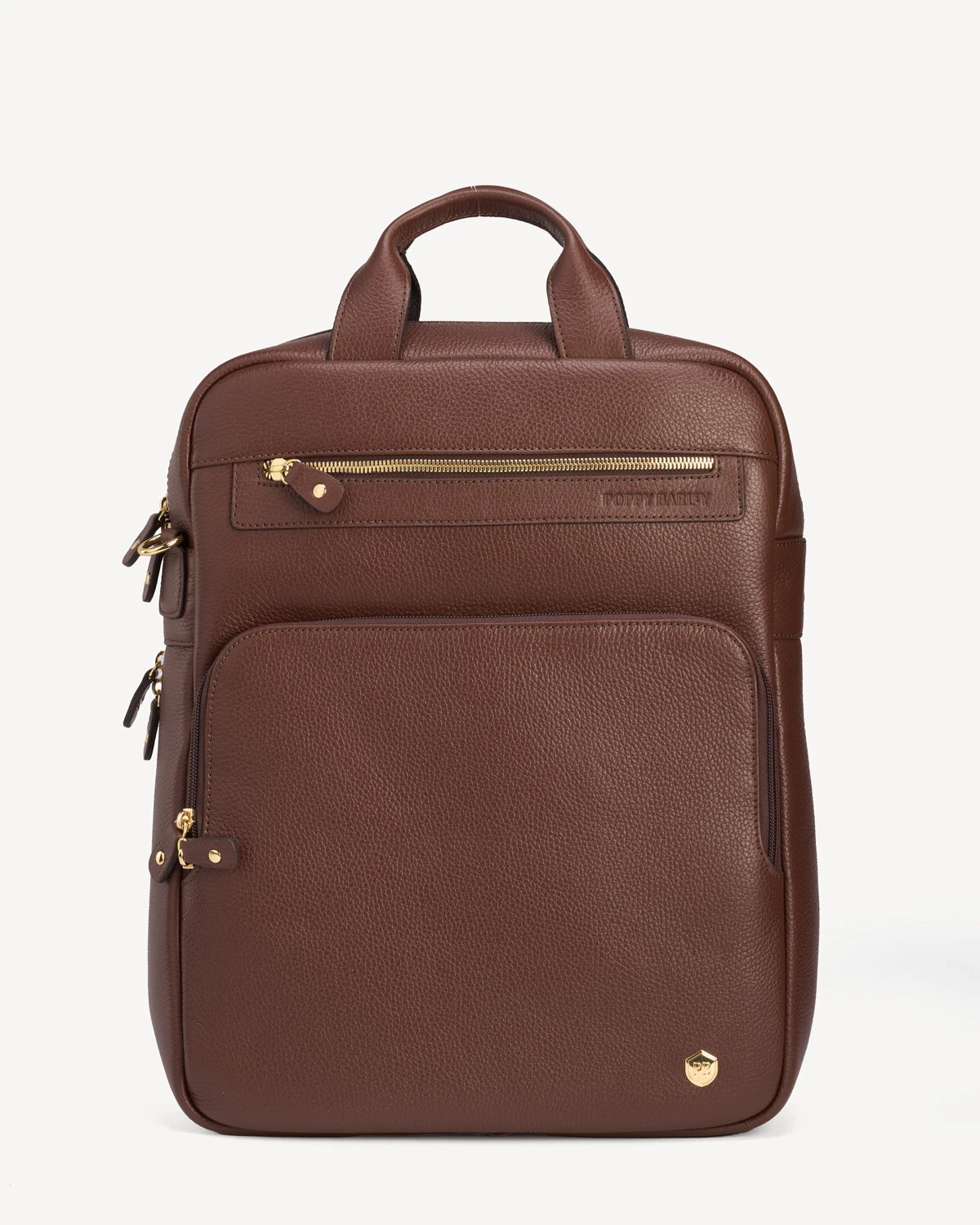 Front view of the pebbled-leather backpack with top handle and zip pockets. The Backpack French Press.