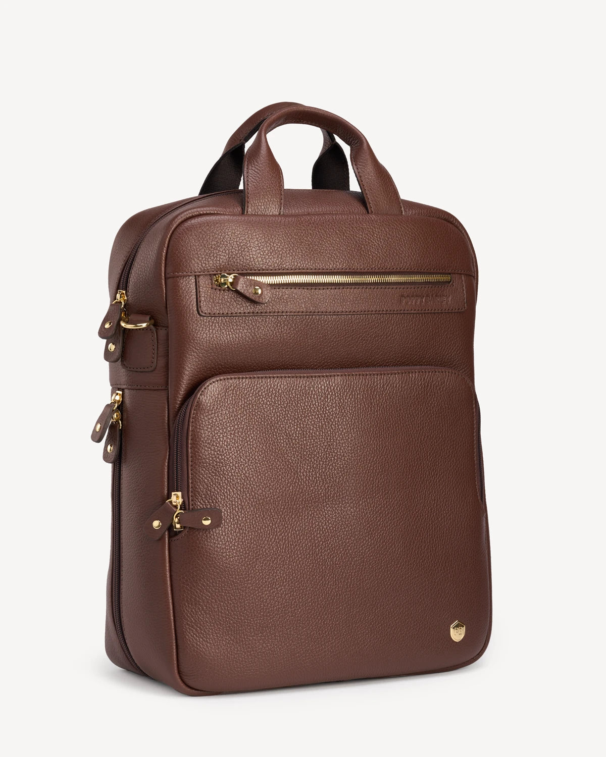 Side view of the pebbled-leather backpack showing front zip pocket. The Backpack French Press.