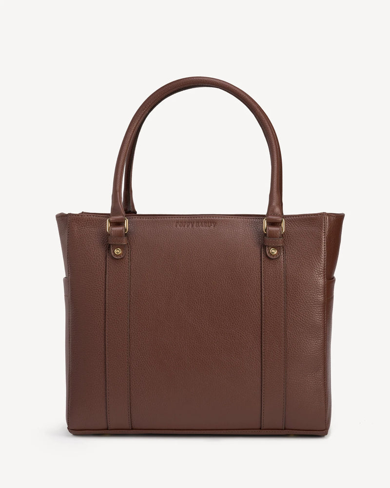 Front view of the structured leather tote with double top handles. The Colleague Tote French Press.