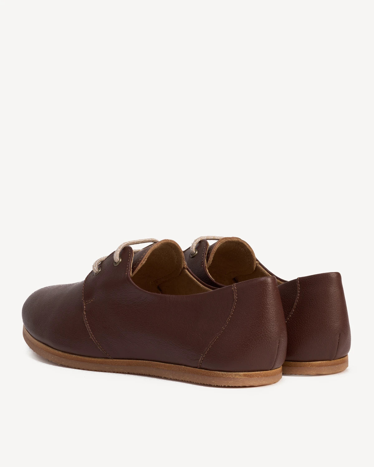 Side view of pebbled-leather oxfords, low-profile sole. The Eyelet Oxford 2.0 French Press. Sizes 5–12, wide available.