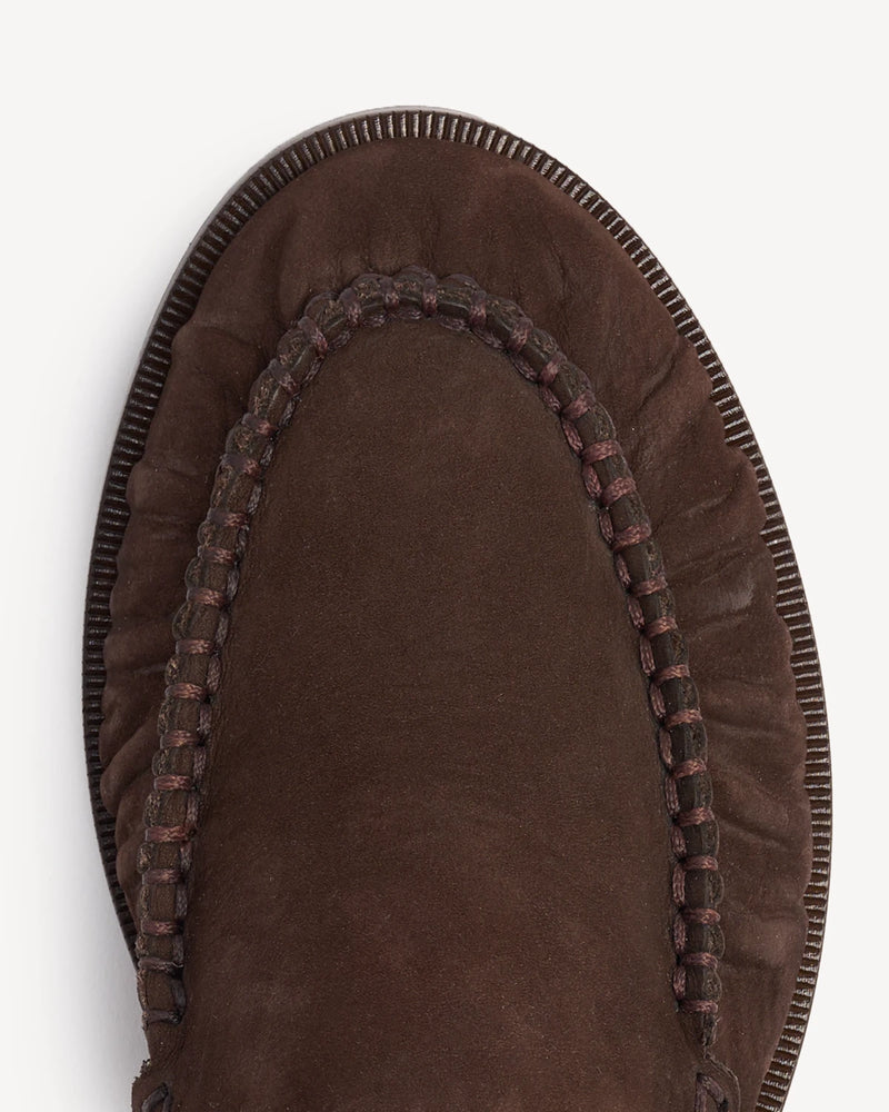 Close-up of the ruched, braid-trimmed apron on a suede loafer. The Laid Back Loafer Cocoa Plum. Sizes 5–12, wide available.